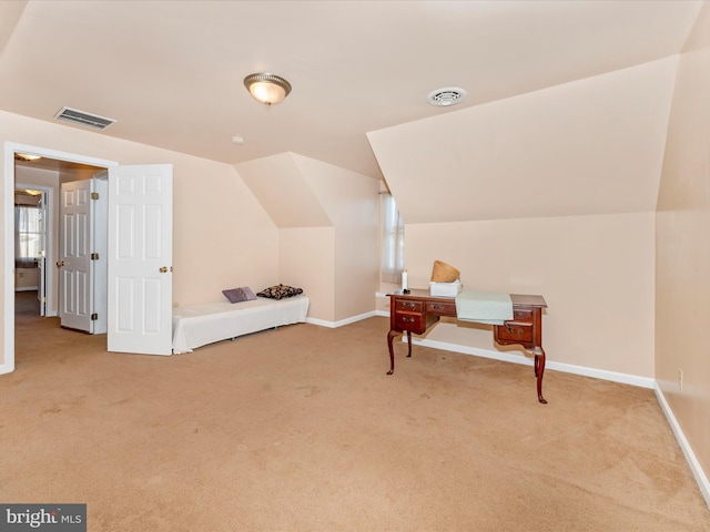 bonus room featuring light colored carpet and lofted ceiling