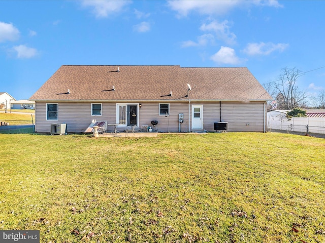 back of house with a patio, central AC, and a lawn