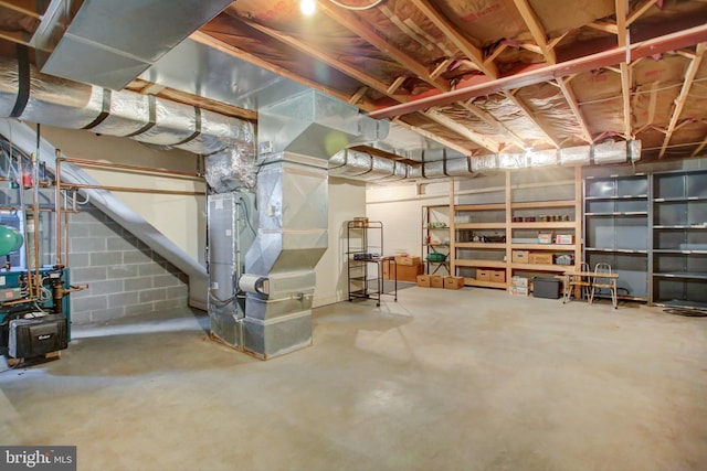 basement featuring heating unit