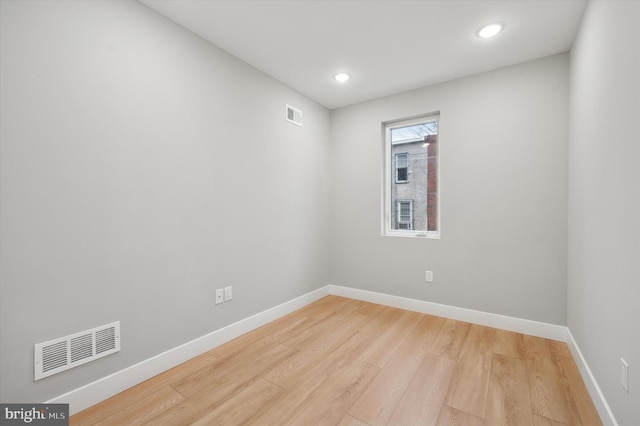 empty room with light wood-type flooring