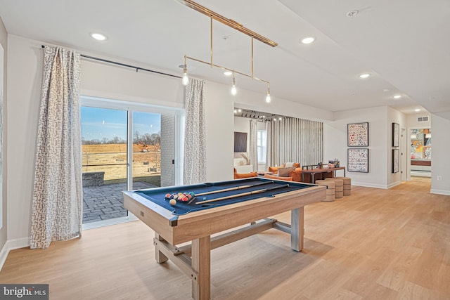 game room with billiards and light hardwood / wood-style flooring