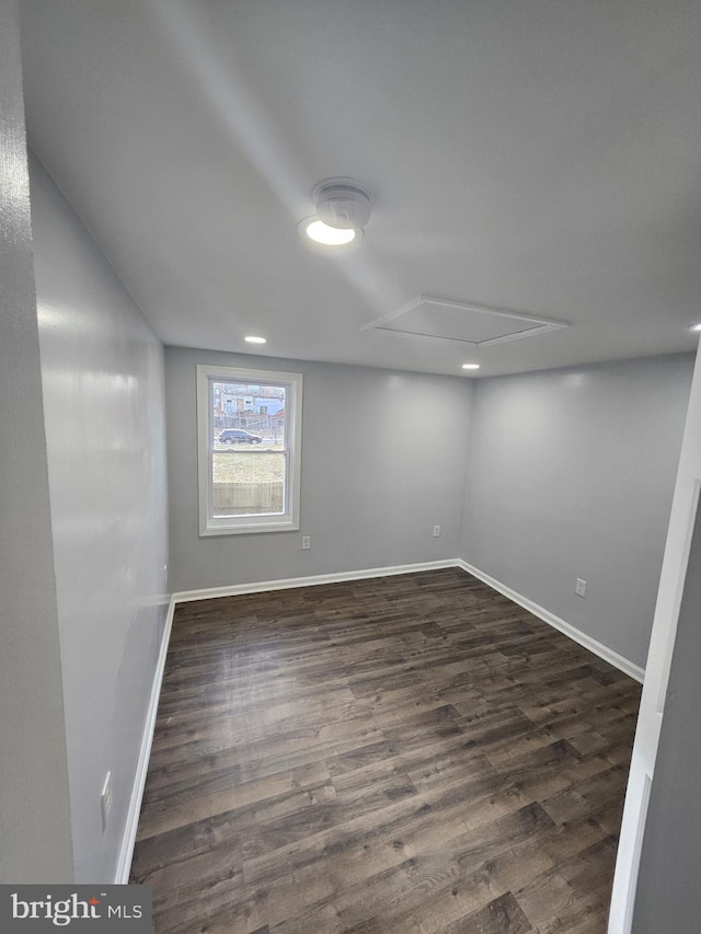 basement featuring dark wood-type flooring