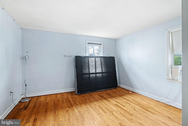 unfurnished room featuring light hardwood / wood-style flooring