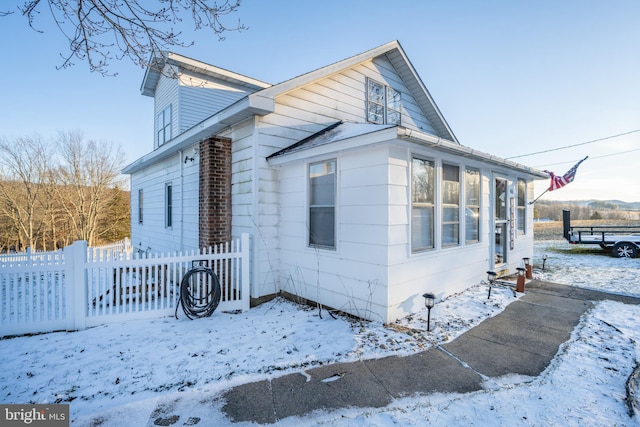 view of snow covered property