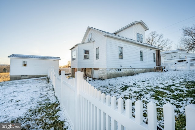 view of snow covered property