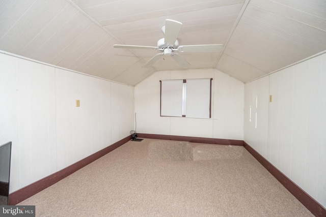 bonus room with carpet floors, ceiling fan, and lofted ceiling