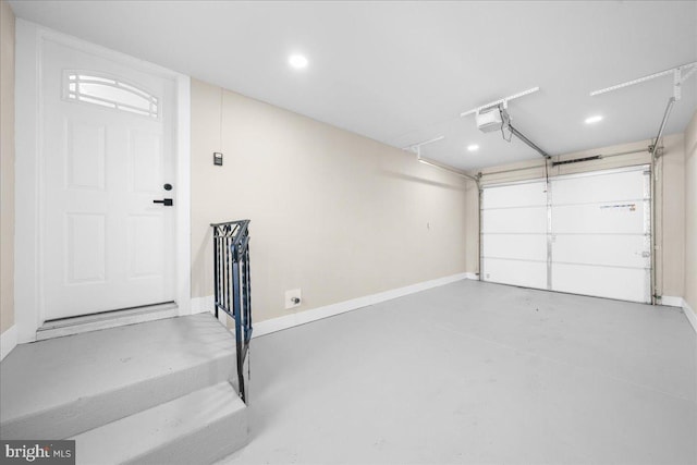 garage featuring a garage door opener