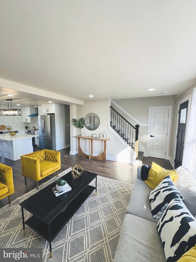 living room featuring dark hardwood / wood-style floors