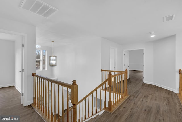 hall featuring wood-type flooring