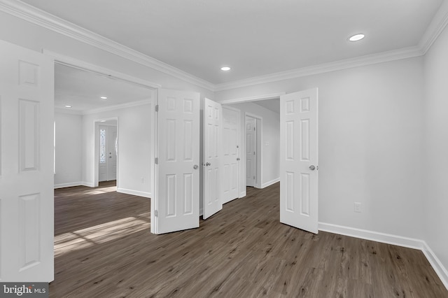 unfurnished room with dark hardwood / wood-style floors and ornamental molding