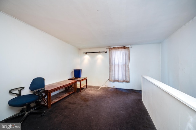 carpeted office featuring crown molding