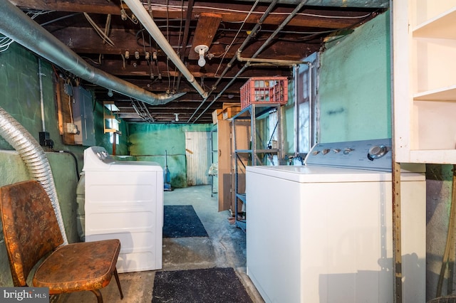 basement featuring washing machine and clothes dryer