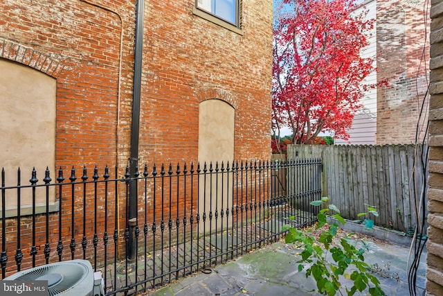 view of home's exterior with central AC unit