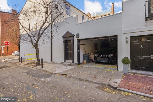 exterior space featuring a garage