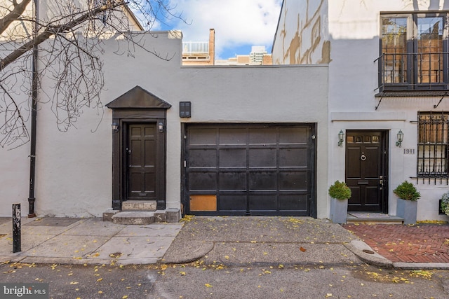 entrance to property with a garage