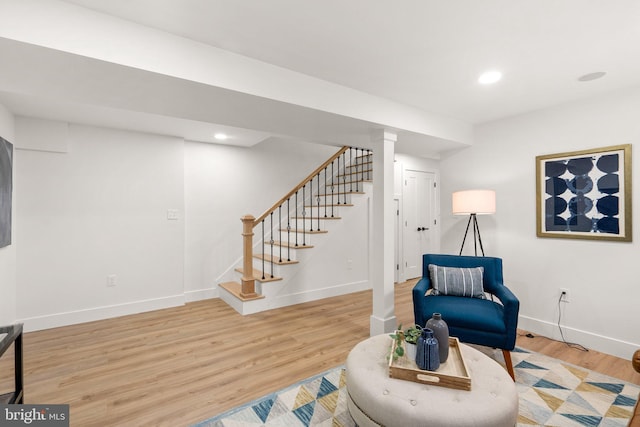 living area with light hardwood / wood-style floors