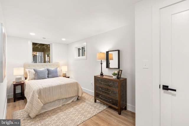 bedroom featuring light hardwood / wood-style floors