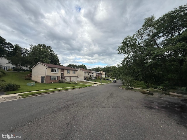 6208 Cheverly Park Dr, Cheverly, MD 20785 - view of asphalt road with curbs, sidewalks, and a residential view