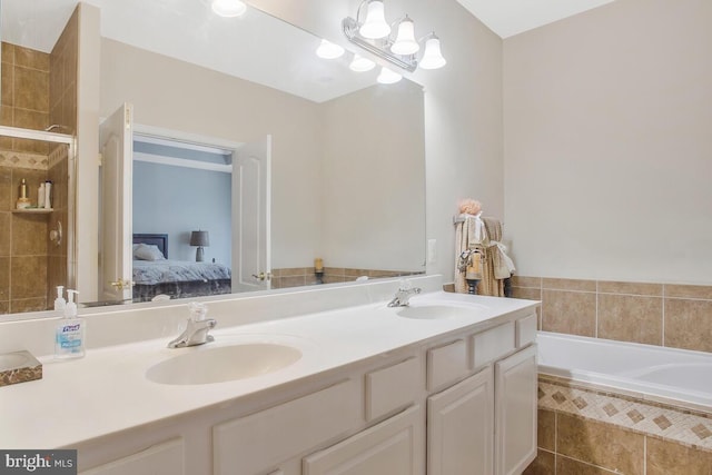 bathroom featuring vanity, independent shower and bath, and a notable chandelier