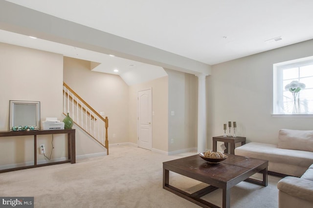 living room featuring light carpet