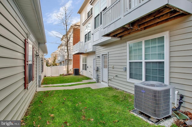 view of yard featuring central air condition unit