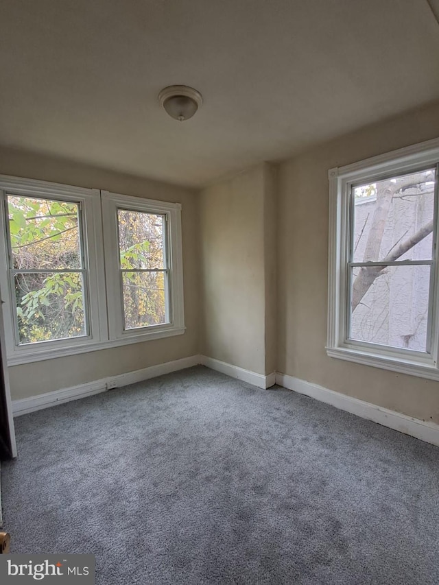 view of carpeted spare room