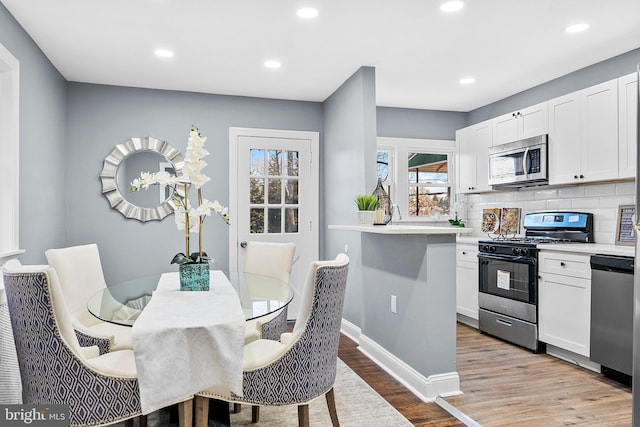 interior space with light hardwood / wood-style flooring