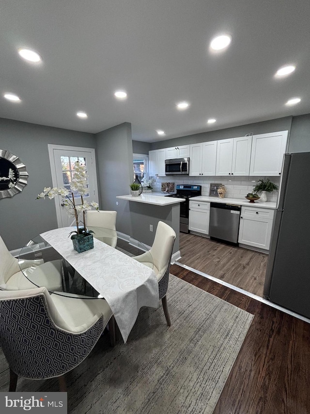 dining room featuring dark hardwood / wood-style floors