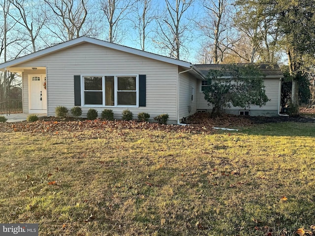 single story home with a front yard