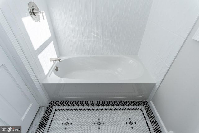 bathroom with tile patterned flooring