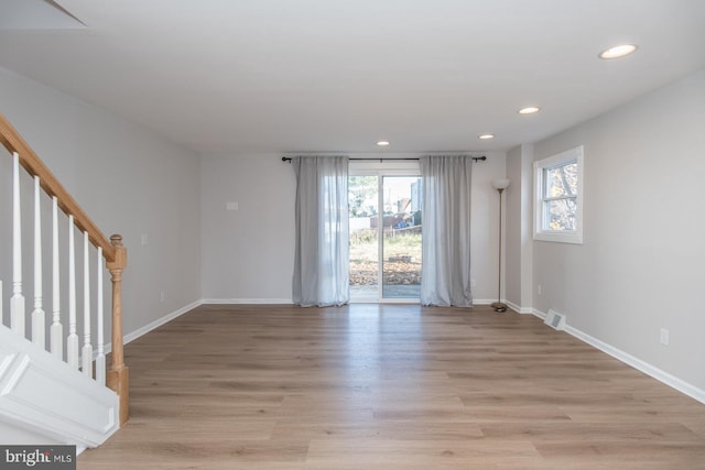 unfurnished room featuring light wood-type flooring