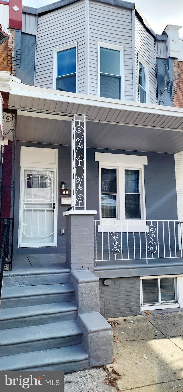 property entrance with a porch