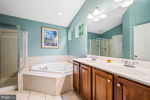 bathroom featuring tile patterned floors, vanity, plus walk in shower, and vaulted ceiling