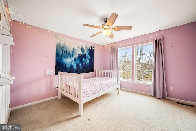 unfurnished bedroom with carpet and ceiling fan