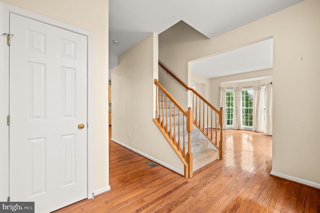 entryway with light hardwood / wood-style flooring