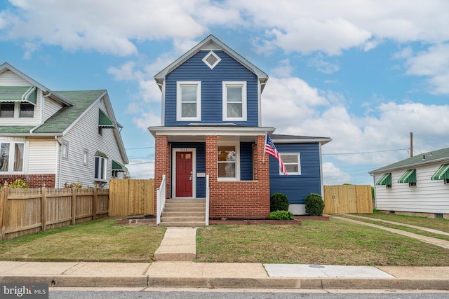 view of front facade with a front lawn