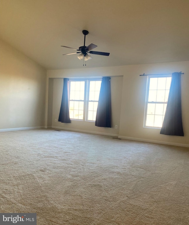 carpeted empty room with ceiling fan