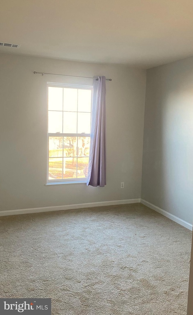 empty room with carpet floors