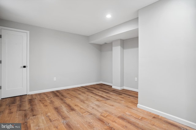 basement featuring light wood-type flooring