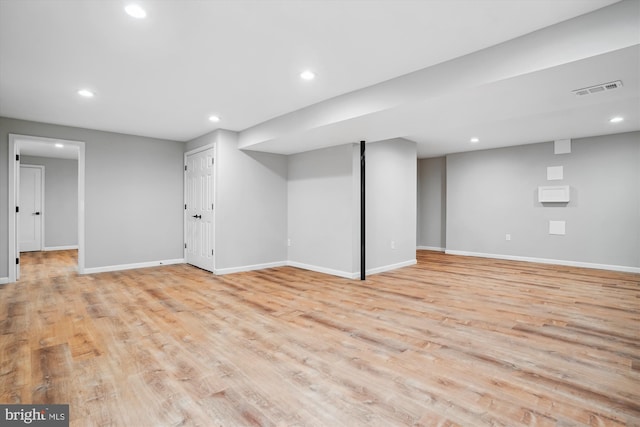 basement with light wood-type flooring