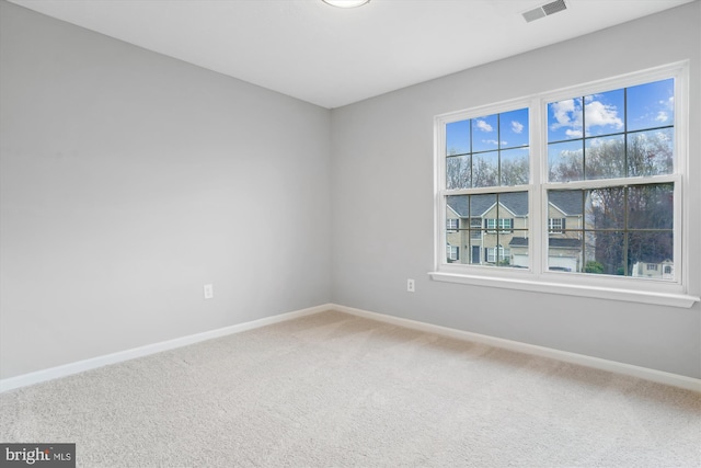 view of carpeted spare room