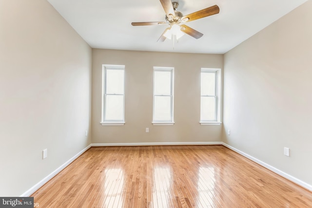 unfurnished room featuring ceiling fan and light hardwood / wood-style flooring