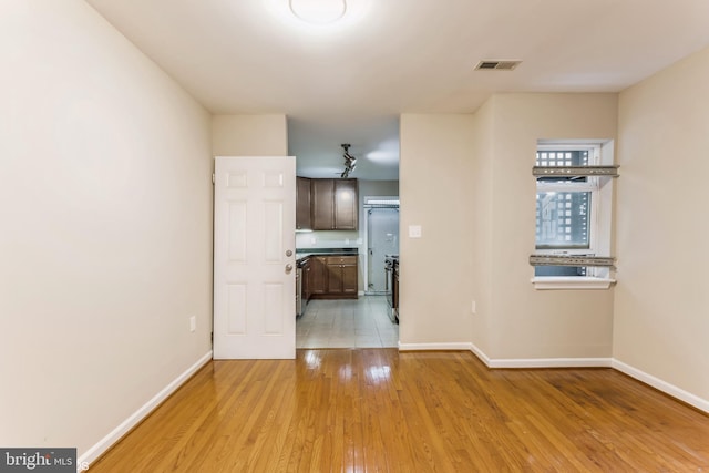 empty room featuring light hardwood / wood-style flooring