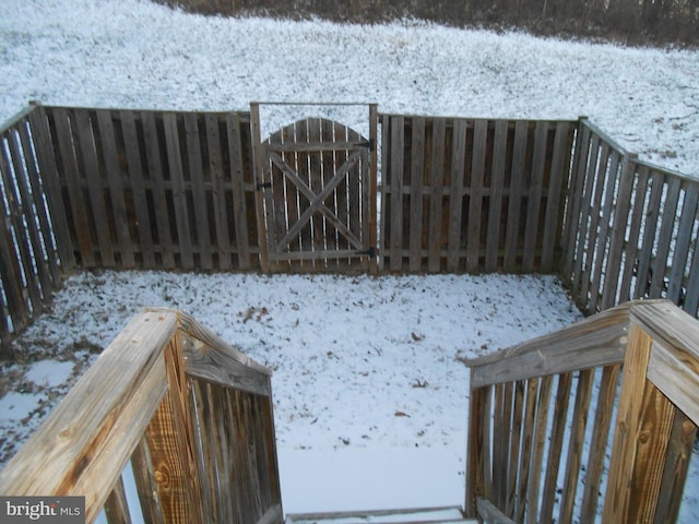 view of yard covered in snow