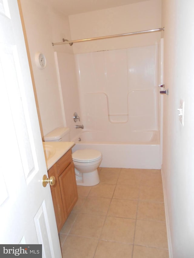 full bathroom with tile patterned floors, vanity, toilet, and shower / washtub combination