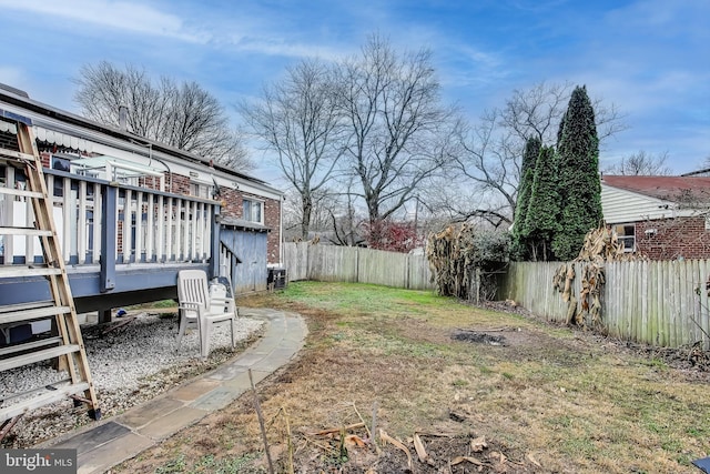 view of yard featuring a deck