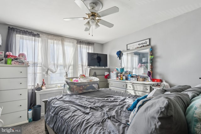 bedroom featuring ceiling fan and carpet floors