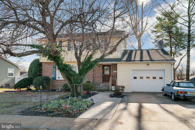 view of front of property with a garage