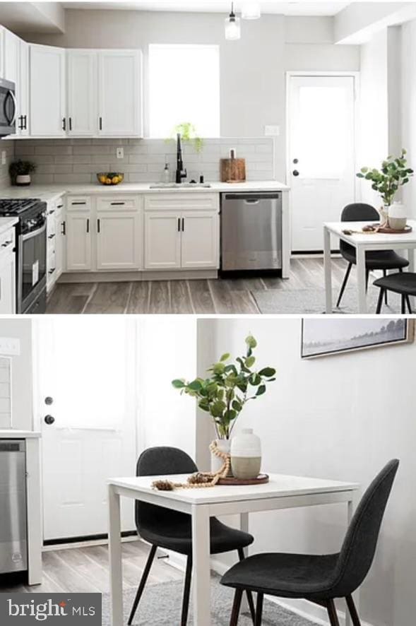 kitchen with decorative backsplash, appliances with stainless steel finishes, white cabinetry, and sink