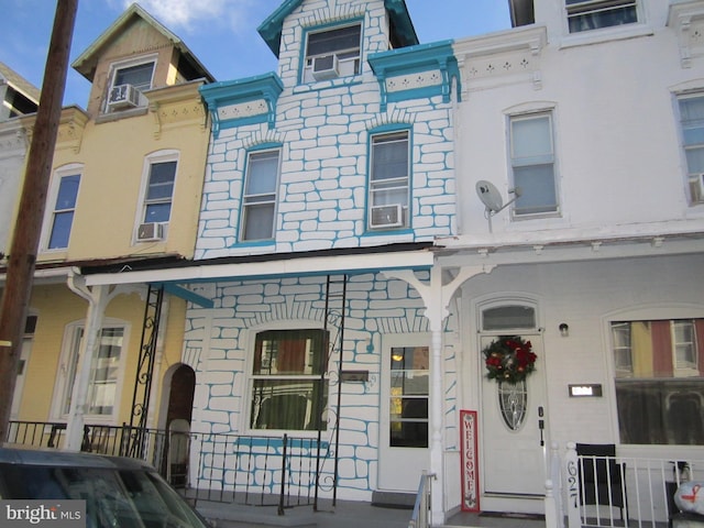 view of front of house with cooling unit